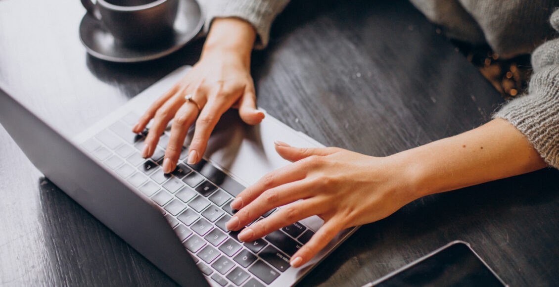 Female Hands Typing On Computer Keyboard