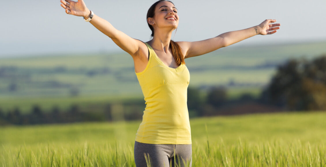 Beautiful Young Woman Enjoying The Spring Standing In A Cereal F