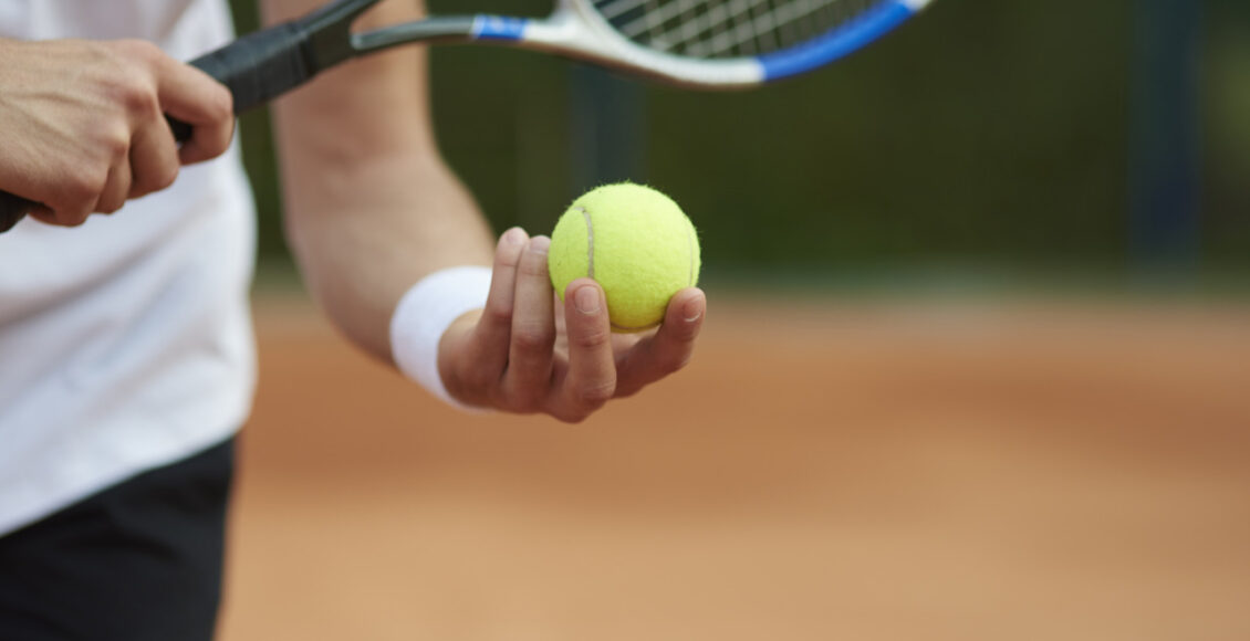 Tennis Player Is Trying To Hit The Score