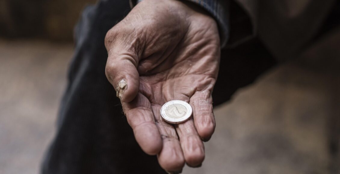 Homeless Man Holding Coin His Hand