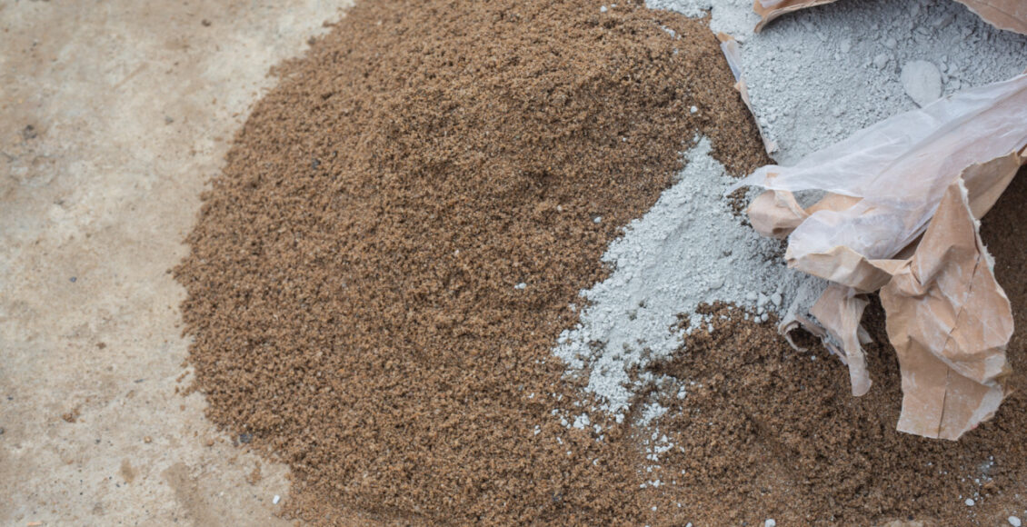 Construction Technicians Are Mixing Cement, Stone, Sand For Construction.