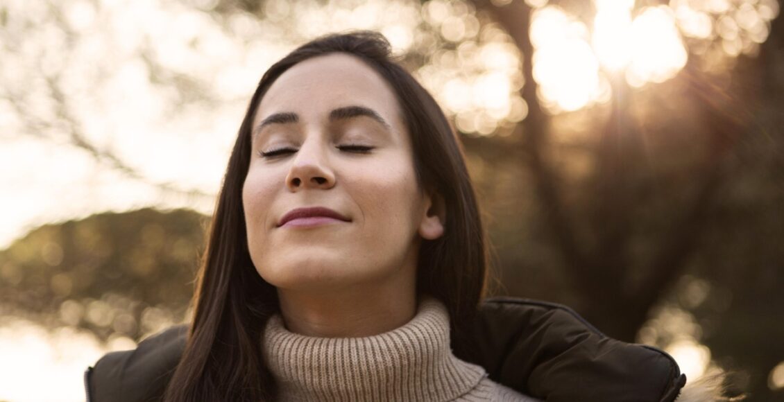 Woman Soaking Up Nature While Outdoors