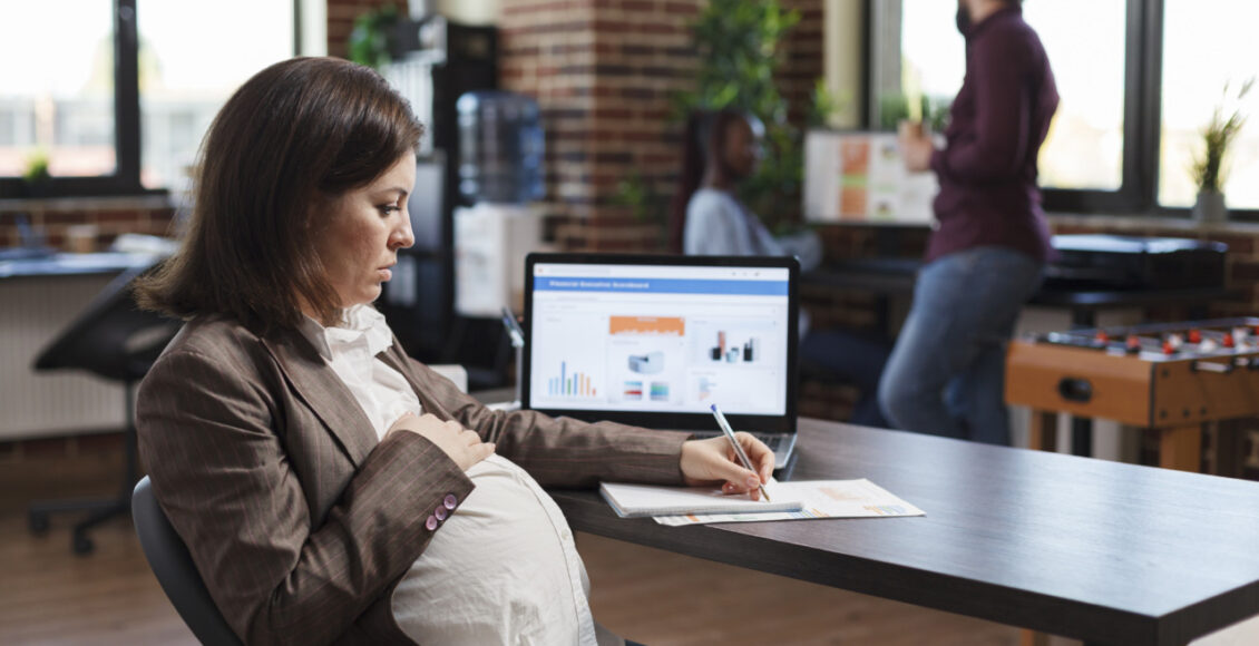 Pregnant Woman Analyzing Economic Growth Of Company And Reviews Financial And Management Chart.